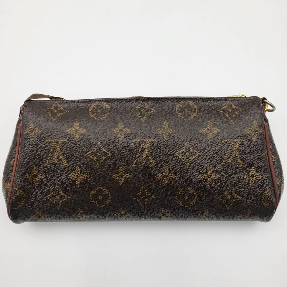 LOUIS VUITTON Eva Monogram Leather Pochette Bag..Authentic..